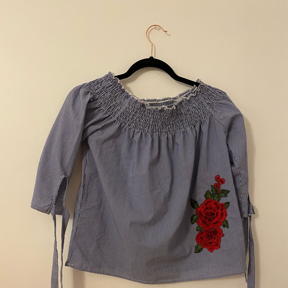 Oversized, off-the-shoulder blouse